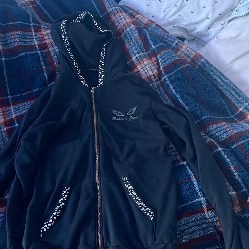 A black Robins Jean light jacket in a size XL